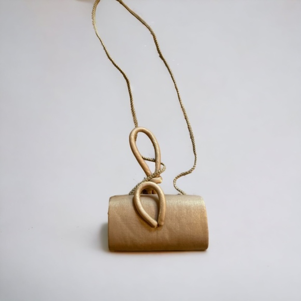 NiteBags gold fabric evening purse